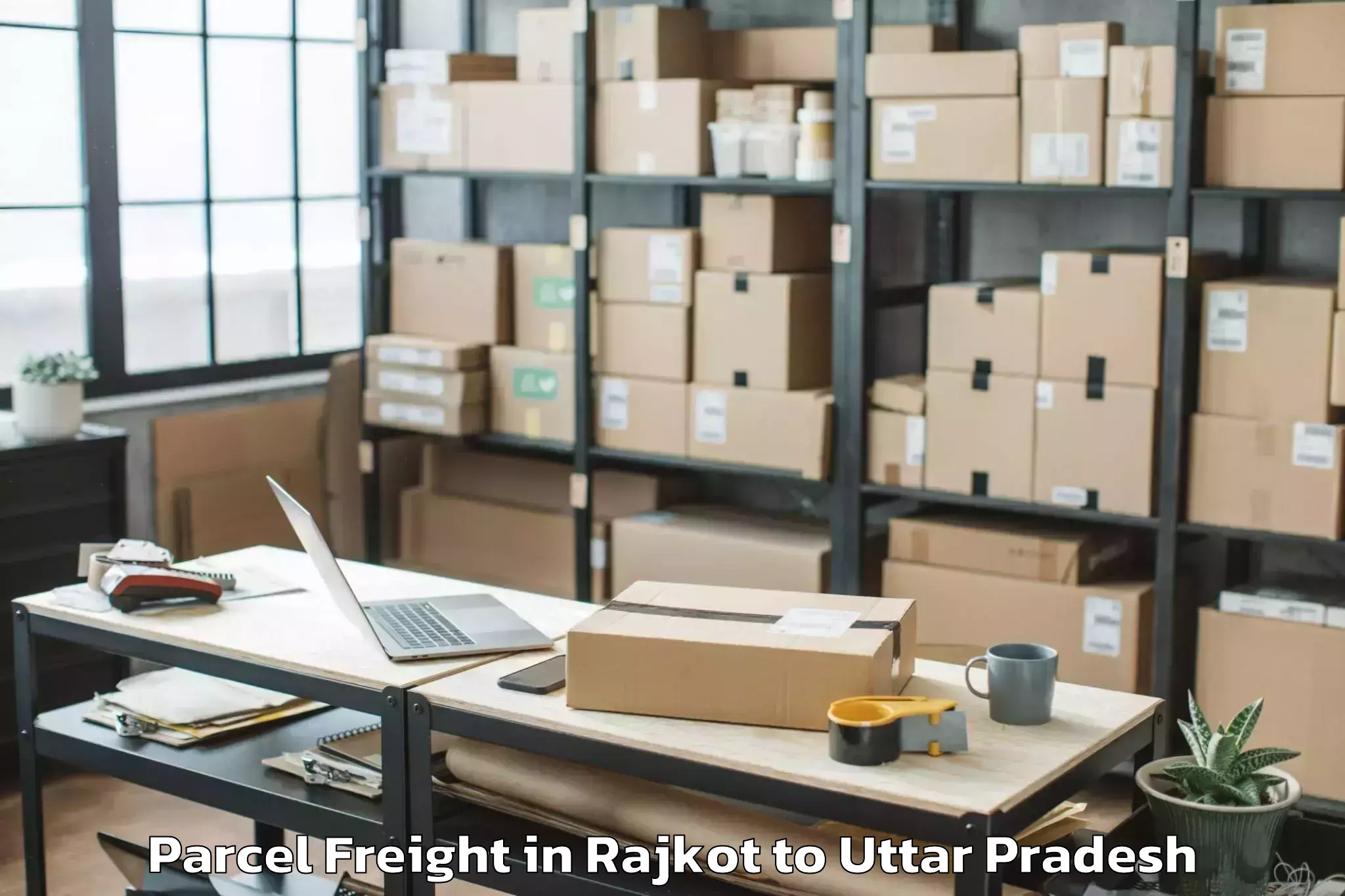 Leading Rajkot to Kaimganj Parcel Freight Provider